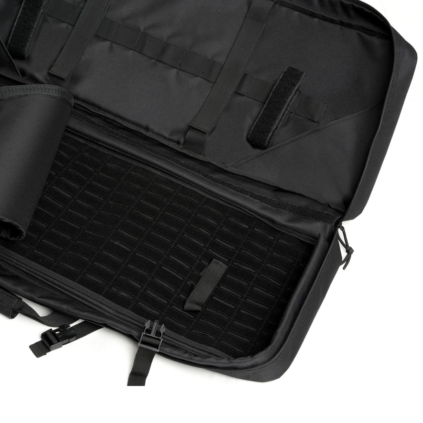 Interior of tactical rifle case with MOLLE webbing and secure straps.
