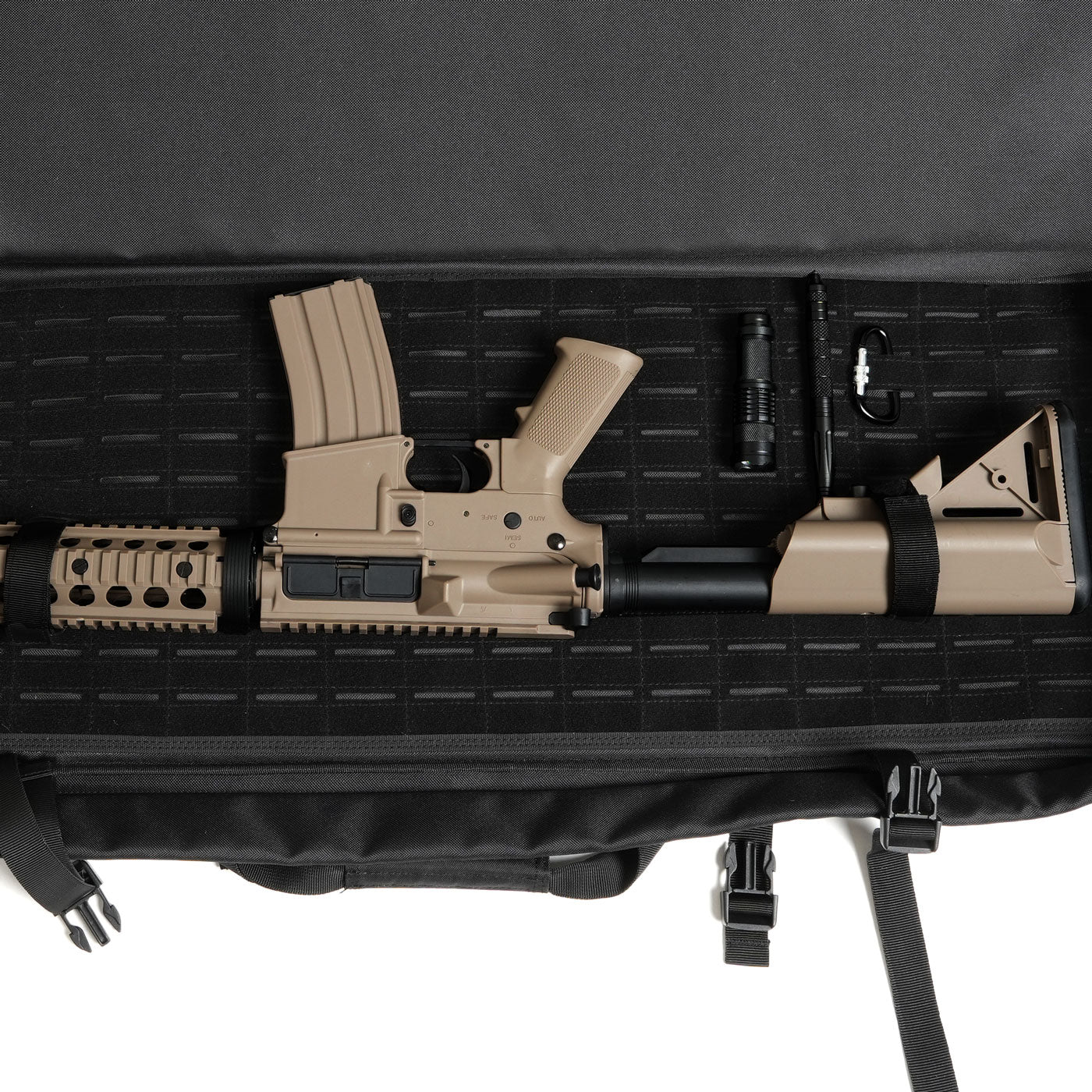 DULCE DOM All Range Pro 2.0 rifle case, tan rifle, flashlight, pen, carabiner inside.