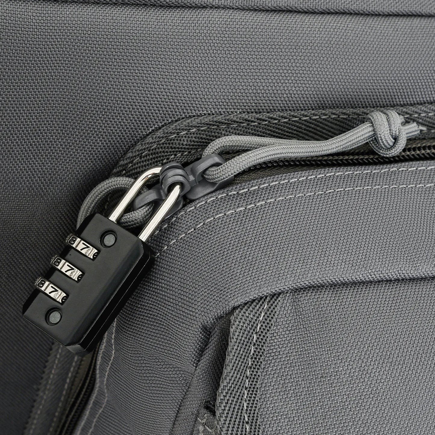DULCE DOM tactical rifle case detail: Combination lock and Oxford fabric zipper for secure rifle transport.