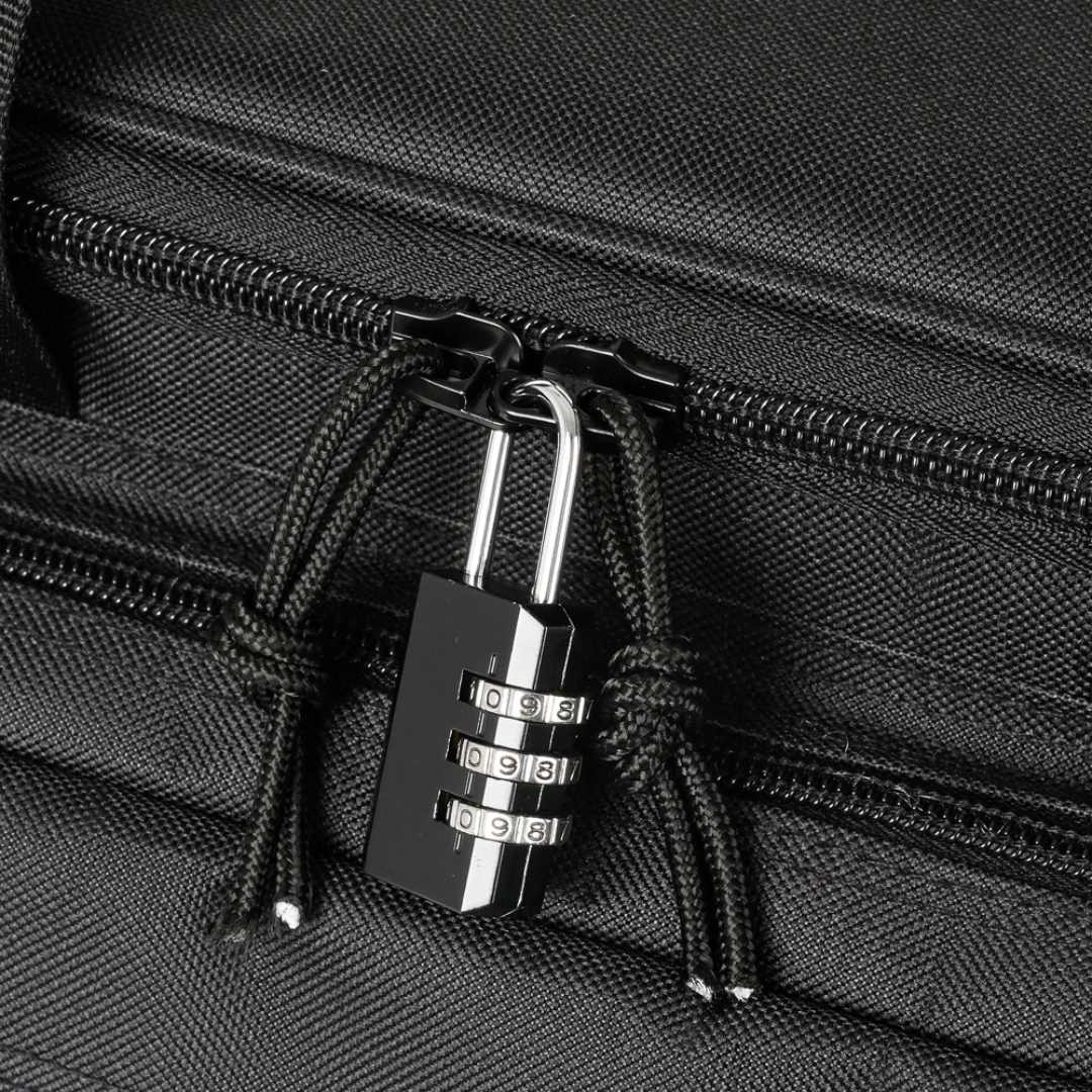 Close-up of a black combination lock securing the zipper pulls on a black bag